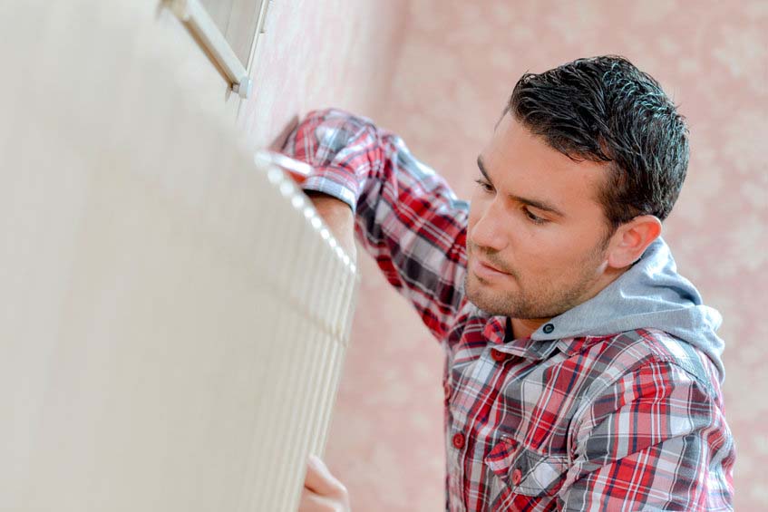 Heating system being inspected by a technician Heating system being inspected by a technician