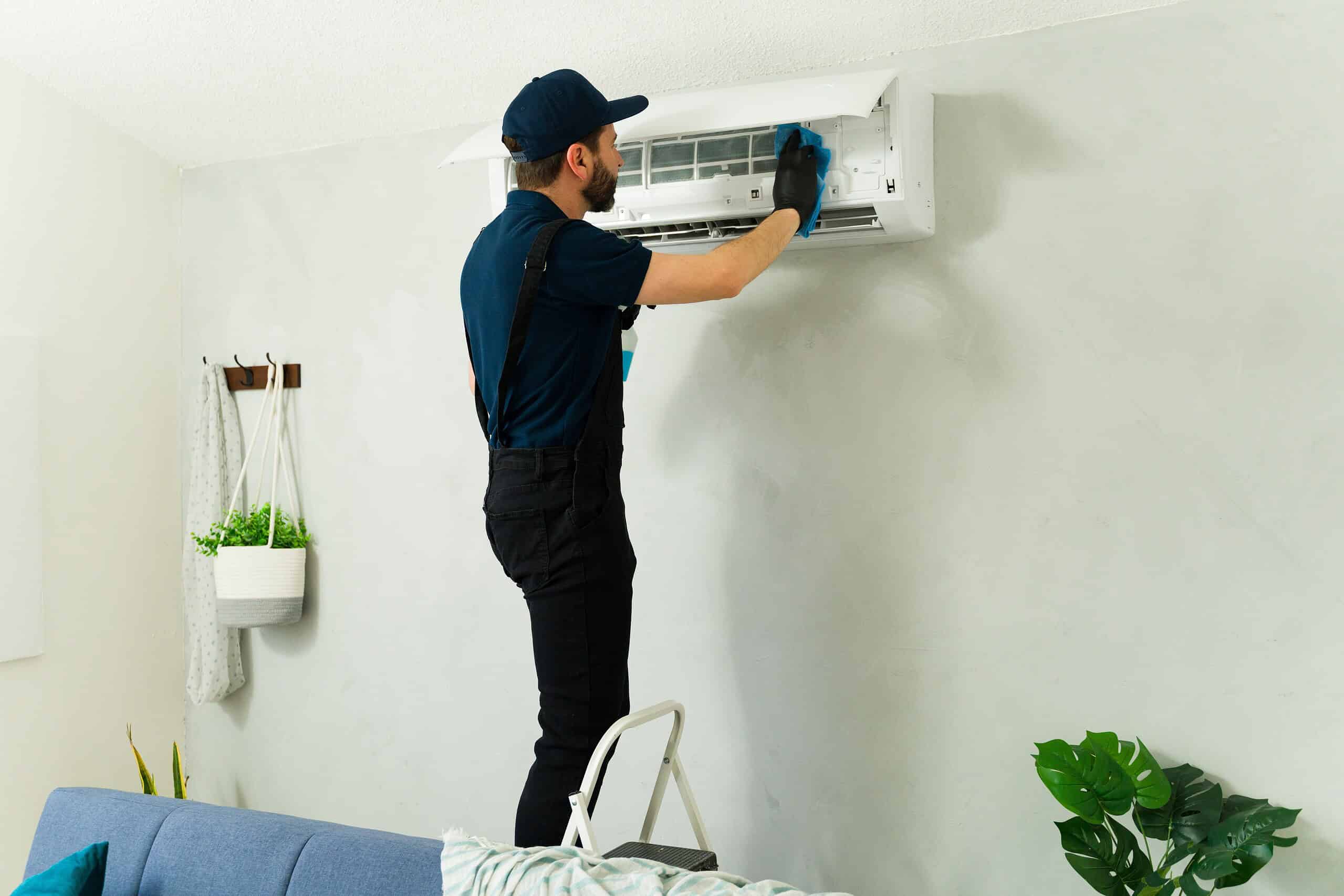 technician-performing-maintenance-on-mini-split