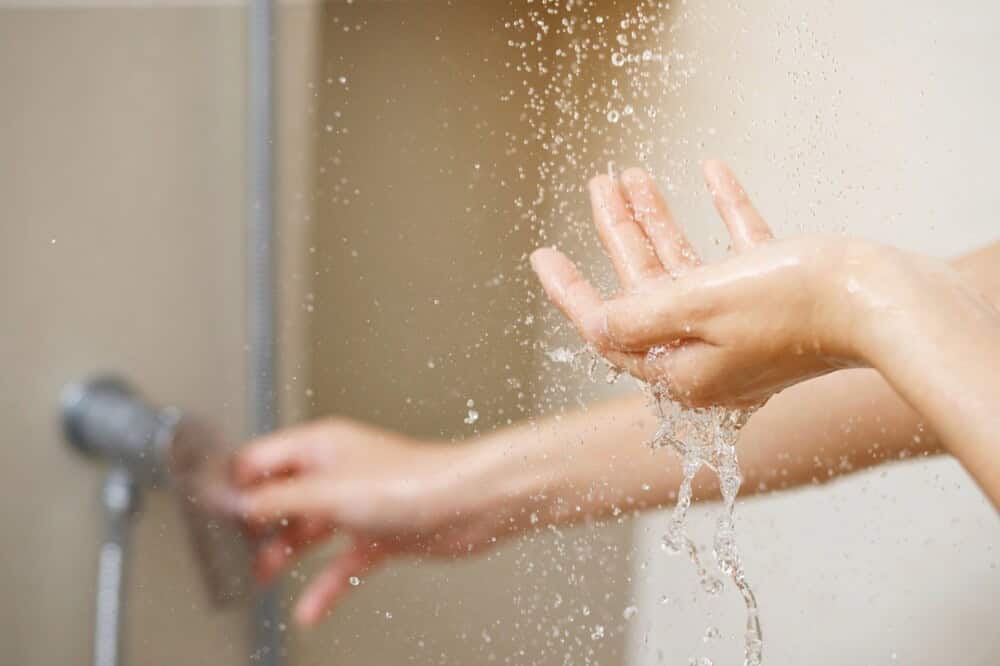 testing hot water in shower